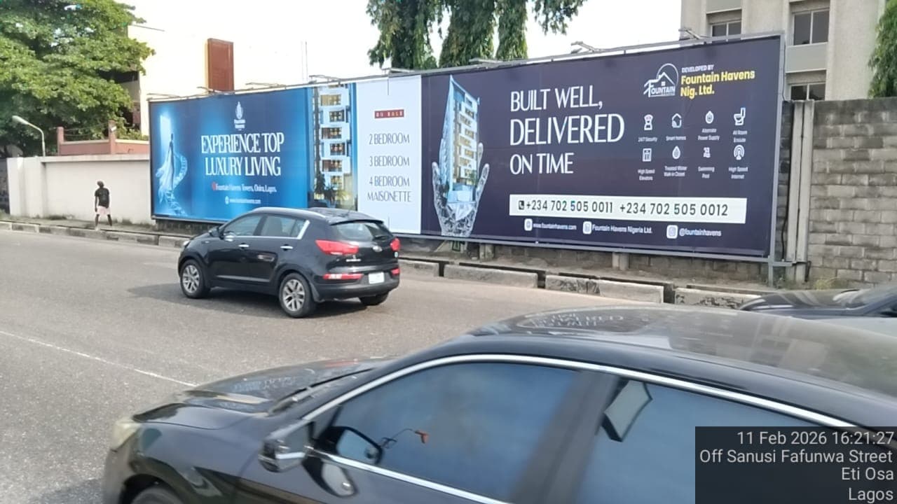 Fountain Havens billboard reading Built Well, Delivered On Time, off Sanusi Fafunwa Street.