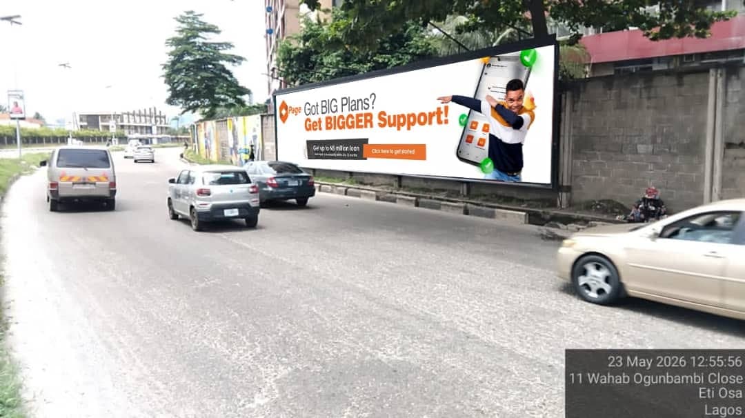 Page Financials billboard reading Got BIG Plans? Get BIGGER Support, on a quiet Lagos road.