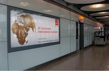 GTBank “African brand. International standards.” panel along a Heathrow corridor.