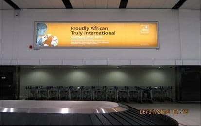 GTBank banner above the empty carousels in the OR Tambo baggage hall.